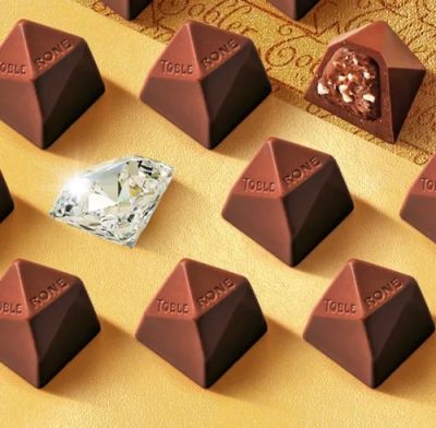 ТОБЛЕРОН ШОКОЛАДОВИ БОНБОНИ ПОД ФОРМАТА НА ДИАМАНТ ГОЛЯМА КУТИЯ 31 БР 300 ГР
