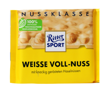 РИТЪР СПОРТ БЯЛ ШОКОЛАД С ЦЯЛ ЛЕШНИК 100 ГР / ЖЪЛТ  /